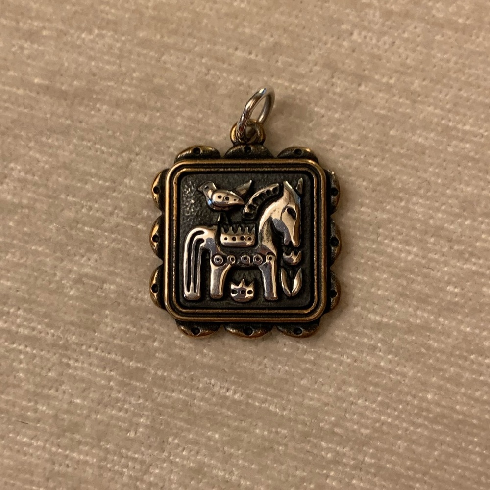 Retired James Avery charm, “Dos Amigos.”  Perfect condition silver and bronze.